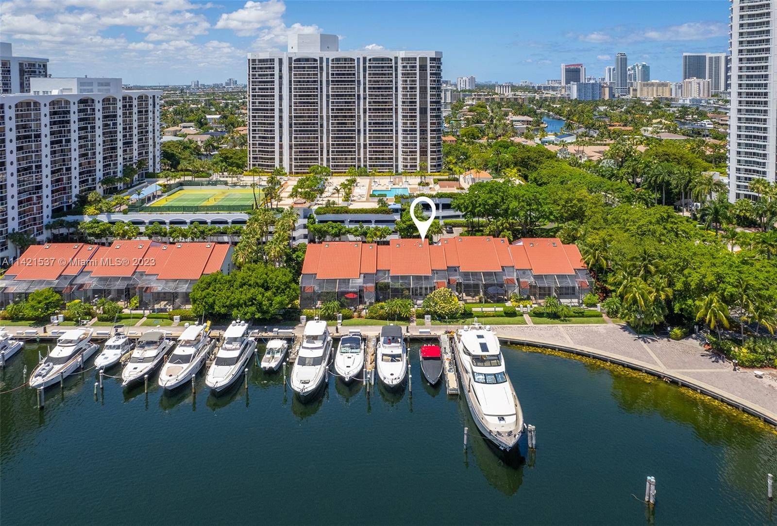 Waterfront townhome nestled in the vibrant heart of Aventura tucked away in the gated community of Portsview.