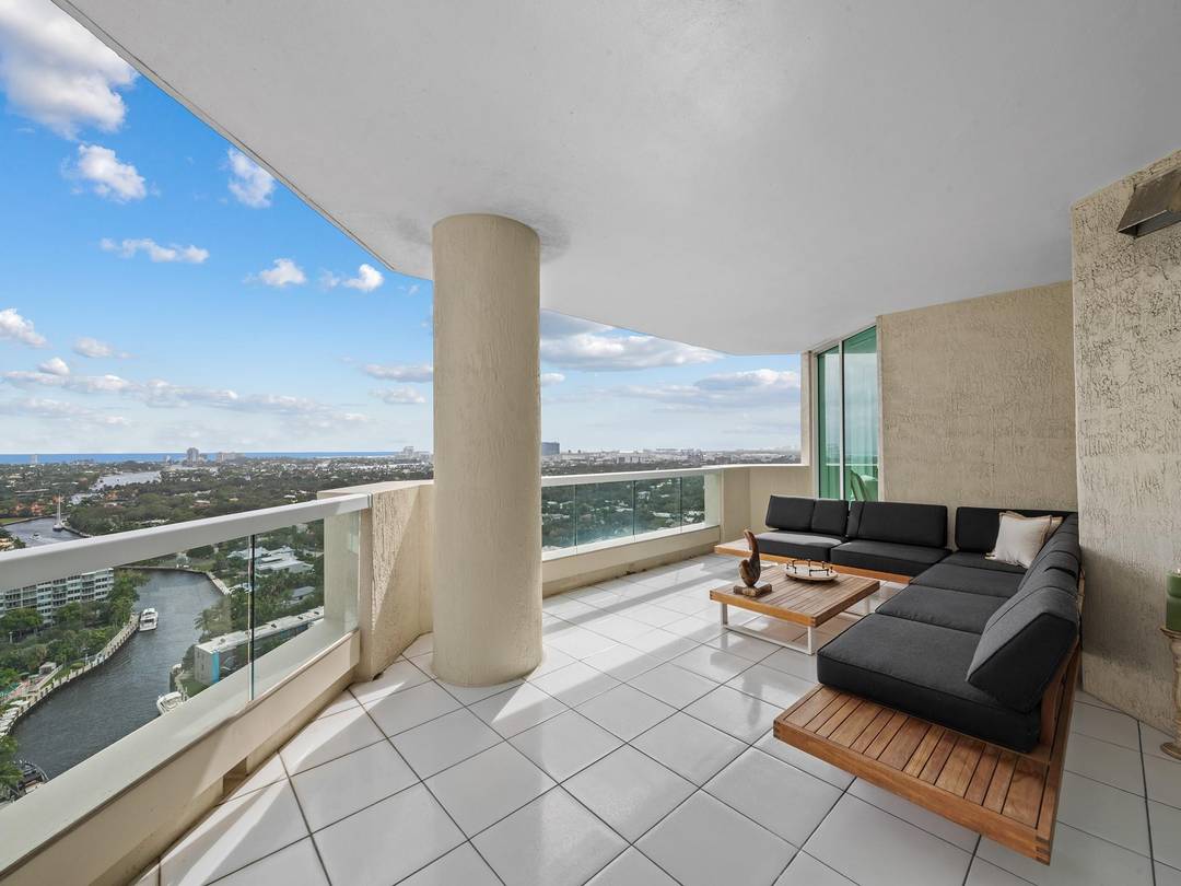 This 3 bedroom, 3 bathroom condo features sweeping vistas of the New River, ocean and skyline showcased from nearly every room.