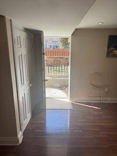 Welcome to this walkout two bedroom basement apartment, featuring a spacious open concept layout that seamlessly integrates the kitchen, living room, and dining area.