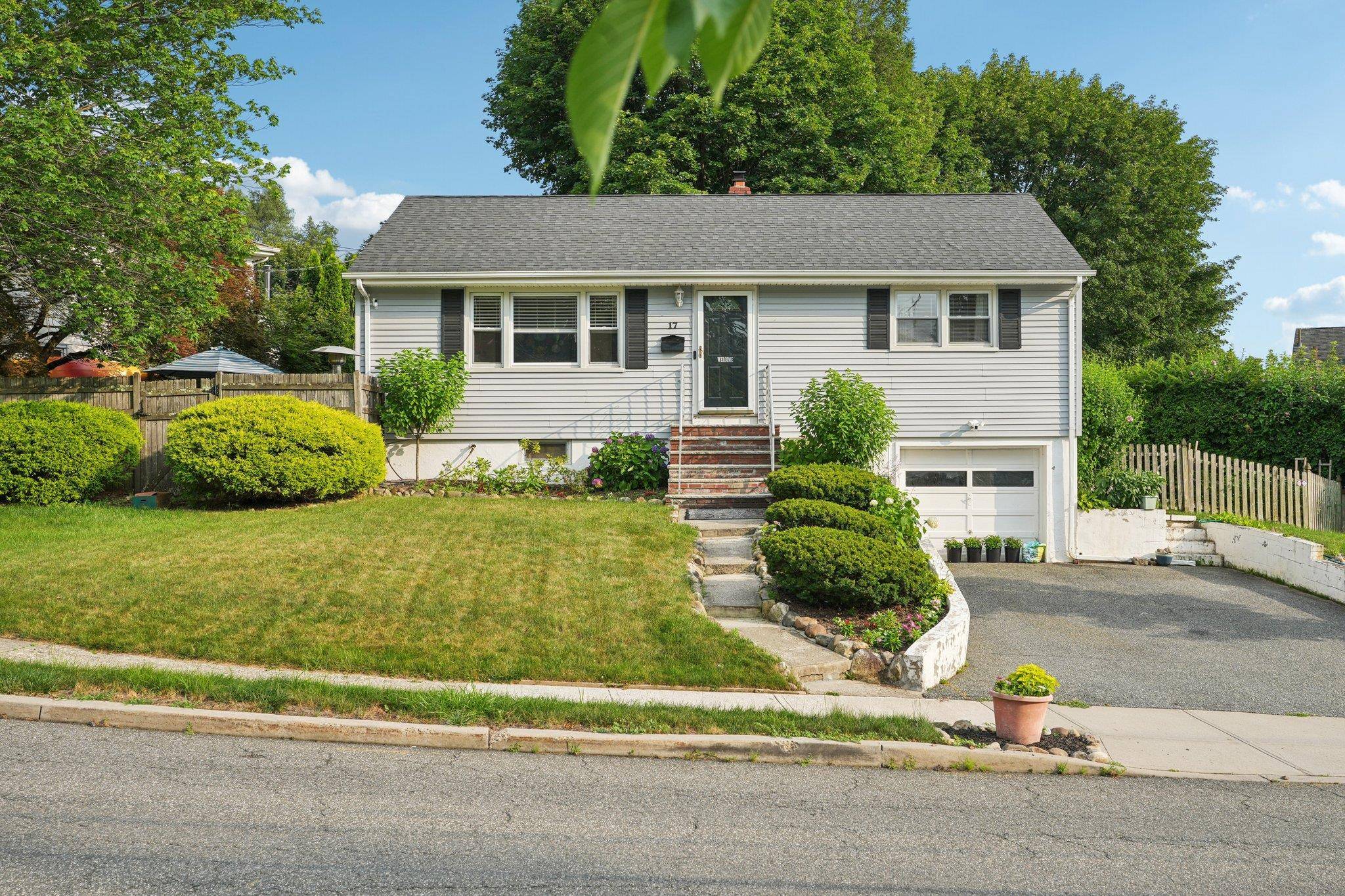 Pristine ranch with full finished basement and new large family bath.
