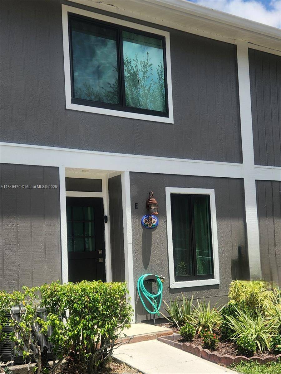 This property is a two bedroom townhouse with two full bathrooms in each room and a half bathroom on the ground floor.
