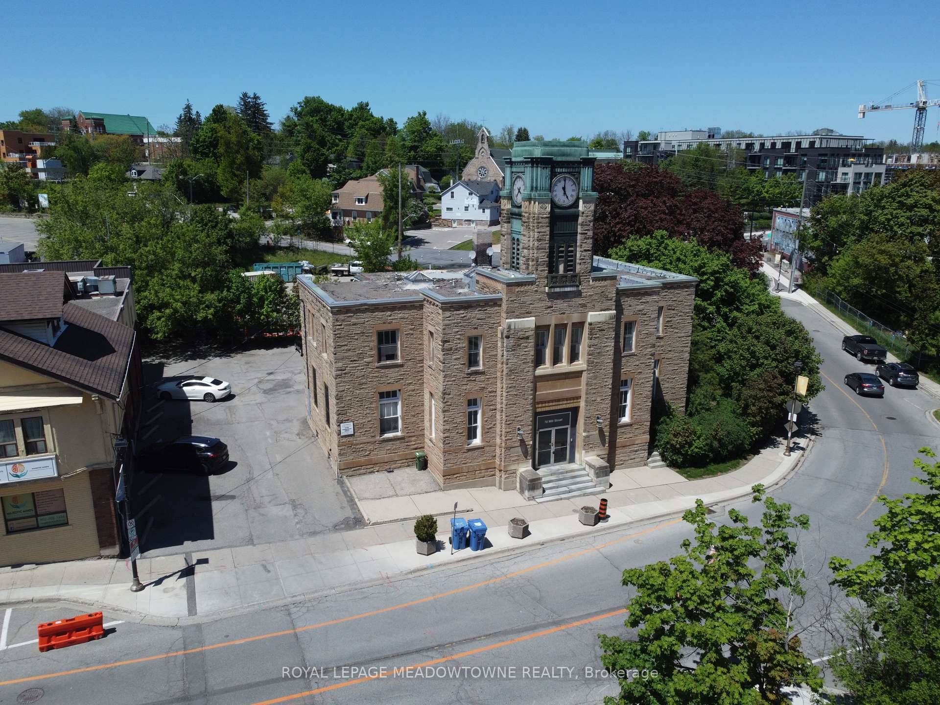 Discover a unique investment opportunity in the vibrant heart of Downtown Georgetown with the combined offering of 70 Mill Street and 72 74 Mill Street.