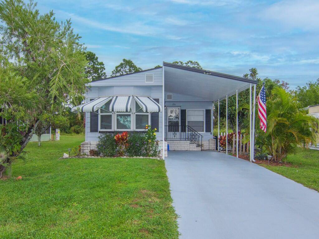 This home is located in the 55 community of Spanish Lakes Golf Village and offers a unique blend of modern comforts and community charm.