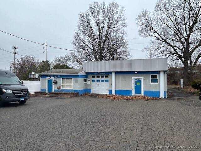 Great opportunity to purchase this near half acre property with an existing 2052 sq foot building on it.