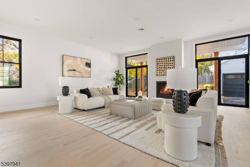 Unit B is a distinguished 4, 537 sf new construction featuring an open concept layout that seamlessly integrates the kitchen, dining, and living areas.