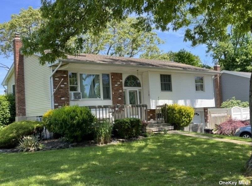 Hi Ranch w Hardwood Floors Formal Living Room Formal Dining Room EIK w ceramic tile and sliders out to wood deck Full Bathroom 3 Bedrooms w Hardwood Floors.