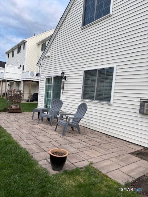 This property is a stunning, rarely available IVES end unit townhouse for sale in the desirable South Windsor Woods community.