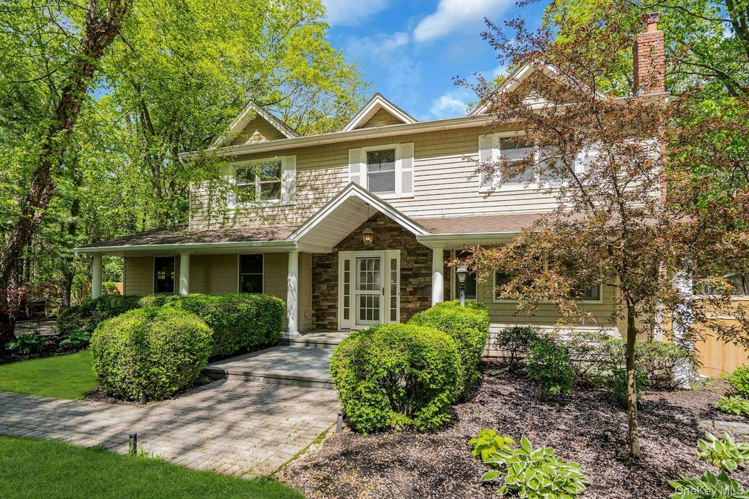 Welcome to 7 McCulloch Drive, Dix Hills A Renovated One Acre Colonial Set on a one acre property backing preserved parkland, this renovated 4 bedroom, 3 bath Colonial is located ...
