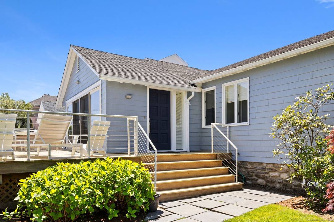 Light, bright Contemporary Ranch with incredible water views of the LI Sound.