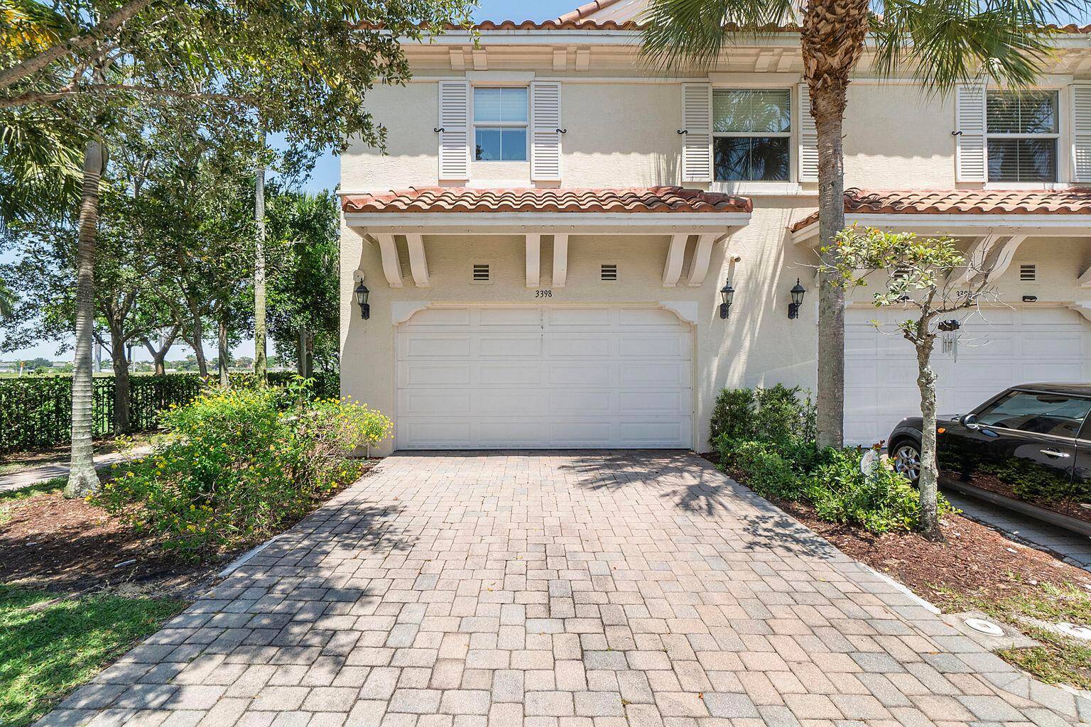 Welcome to this corner end unit townhome in Artesia, where style meets convenience.
