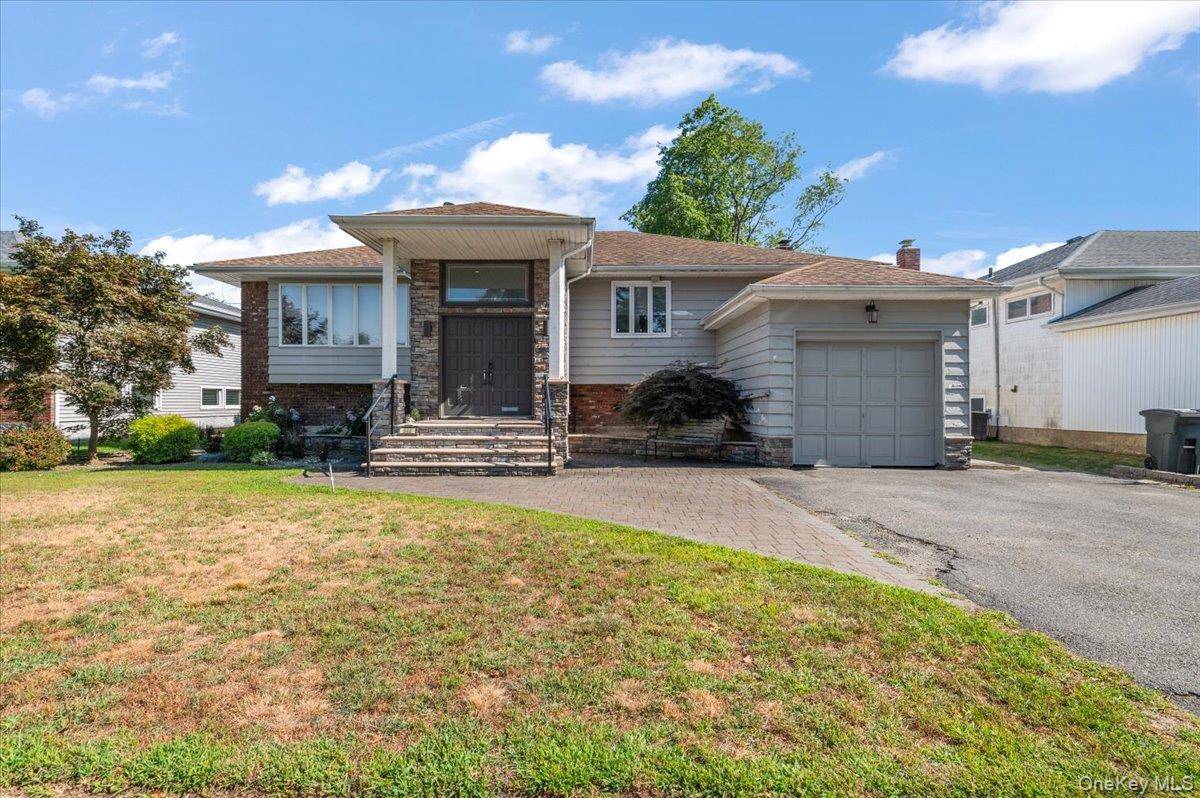 Welcome to this spacious 4 Bedroom, 3 full Bath, high ranch, offering approximately 2, 800 sq.
