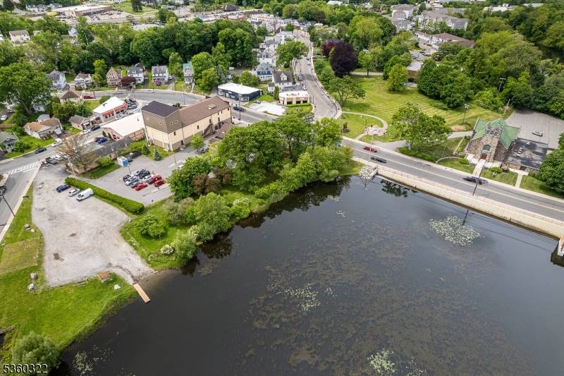 Corner lot and building offer outstanding visibility and accessibility at the heart of Netcong.