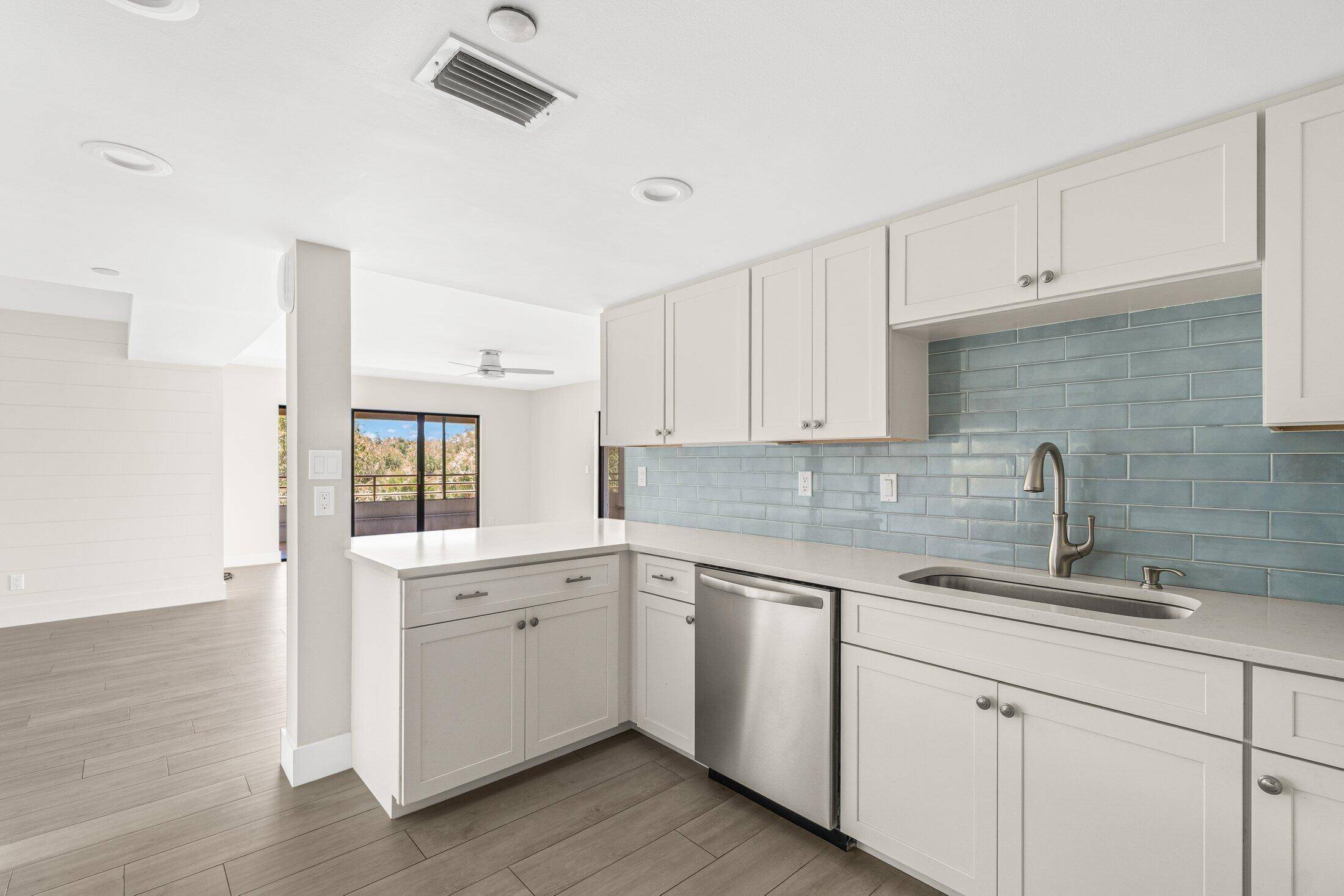 This beautifully renovated corner unit boasts a spacious kitchen, 3 bedrooms, and 3 baths within the charming intercoastal community of Oak Harbor.