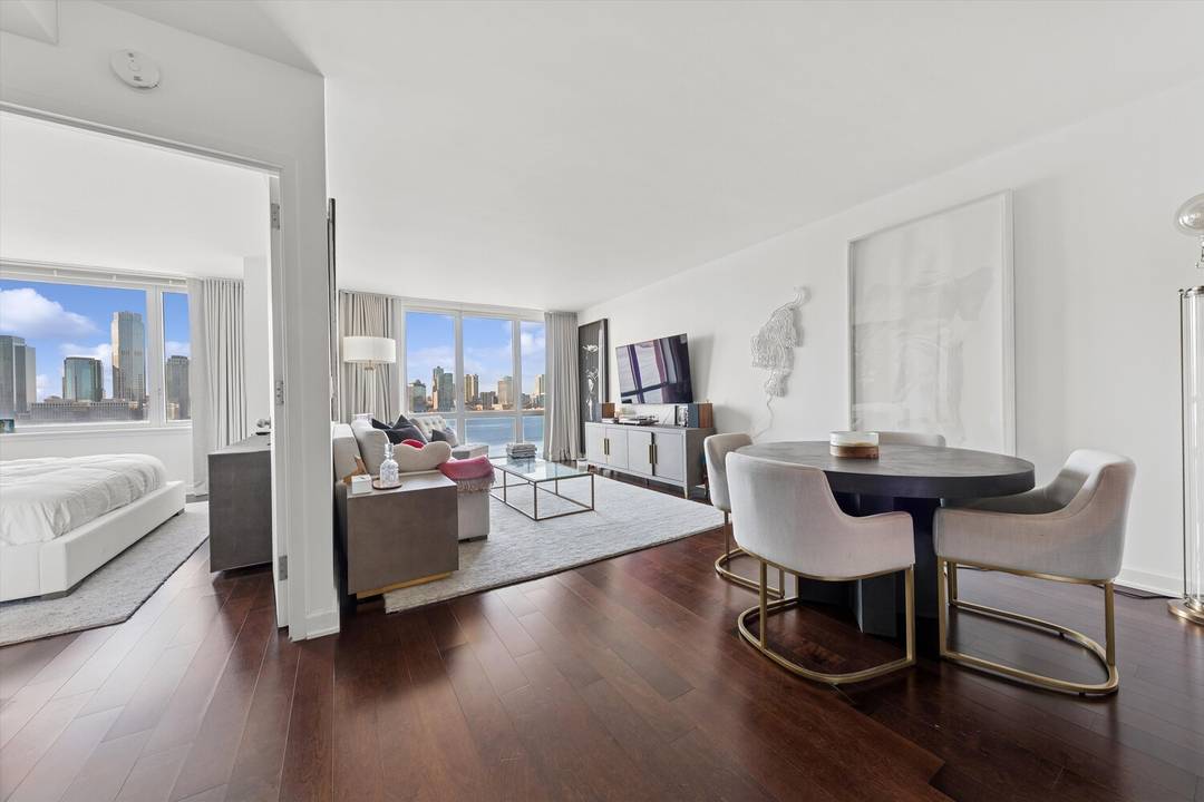 Enjoy spectacular Hudson River views and unforgettable sunsets from this sundrenched, fully furnished 863 sq.