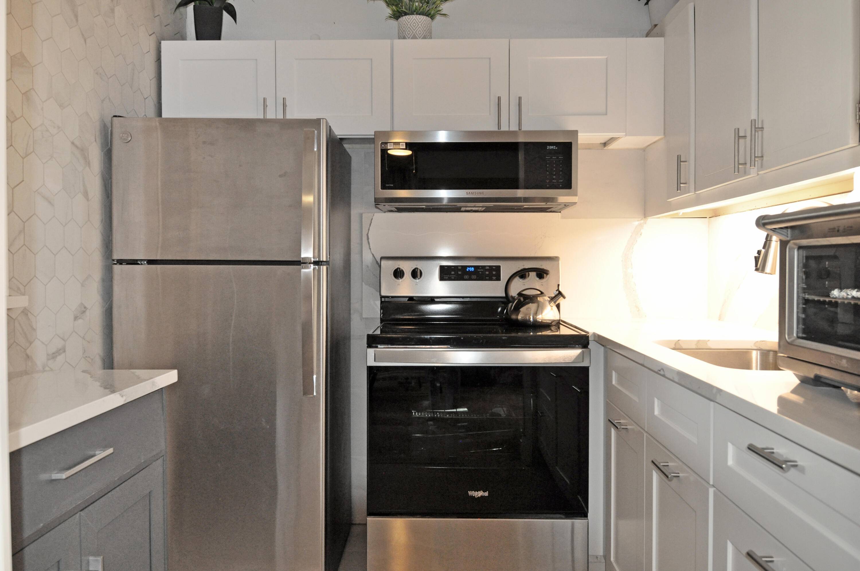 Completely updated with premium materials and top of the line appliances, this home offers modern tile flooring, and beautifully renovated kitchen and bathrooms.