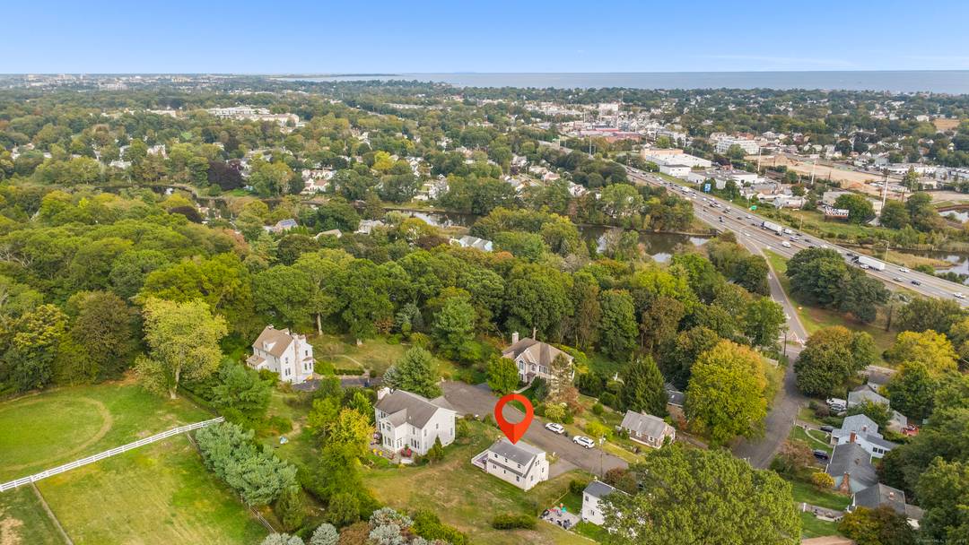 Welcome to this charming Cape Cod style home, offering an inviting entry into the quaint, historic village of Southport.