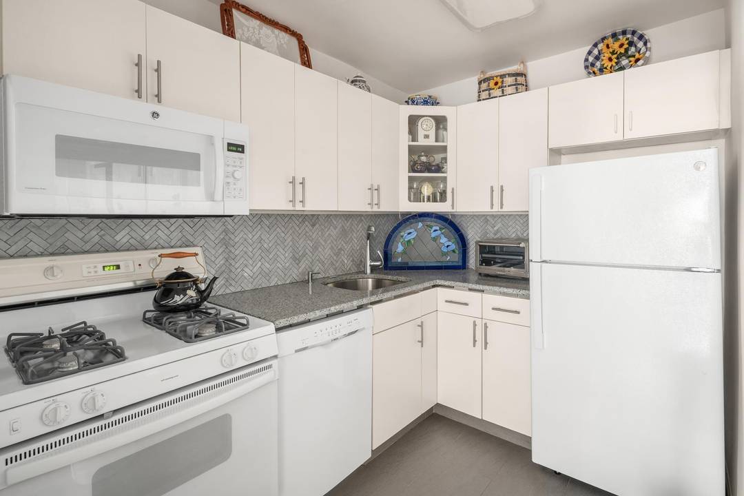 BACK ON THE MARKET A503 is a large two bedroom, two baths, a combination apartment of a studio and one bedroom that really works.