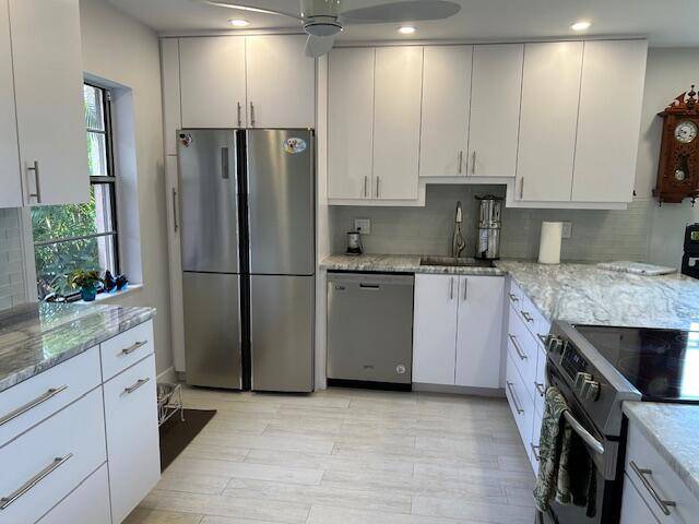Prepared to be wowed ! Remodeled corner 2 2 Villa with Formal Dining area.