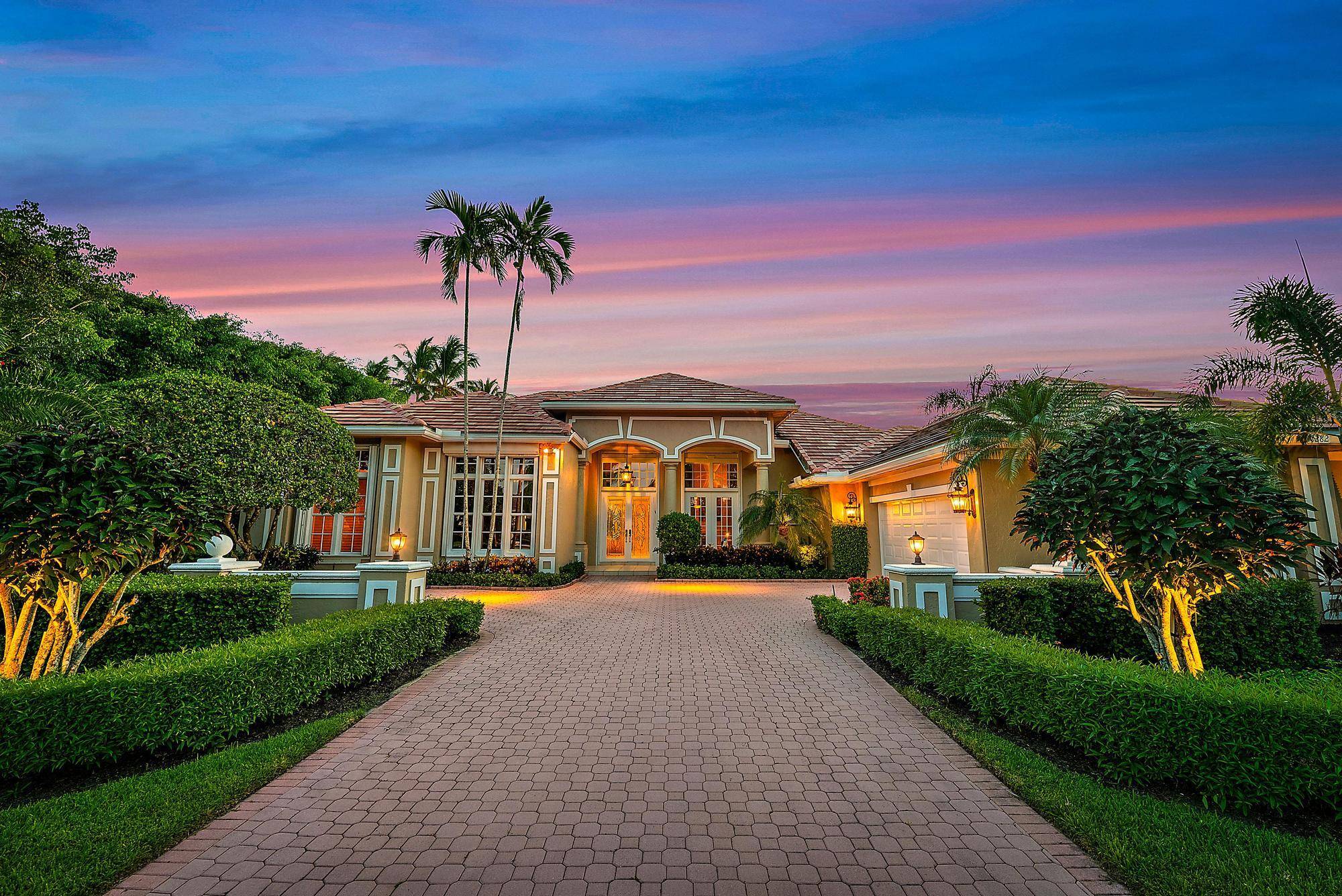 IMMEDIATE PREMIER GOLF MEMBERSHIP AVAILABLE WITH PURCHASE Perfectly positioned on a premium water and golf lot in Ibis's prestigious Herongate neighborhood, this custom 4, 300 SF, 4BR 3.