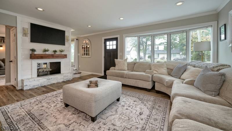 Welcome to this beautifully renovated 5 bedroom, 2 bathroom Colonial in one of Rochelle Park's most desirable neighborhoods.