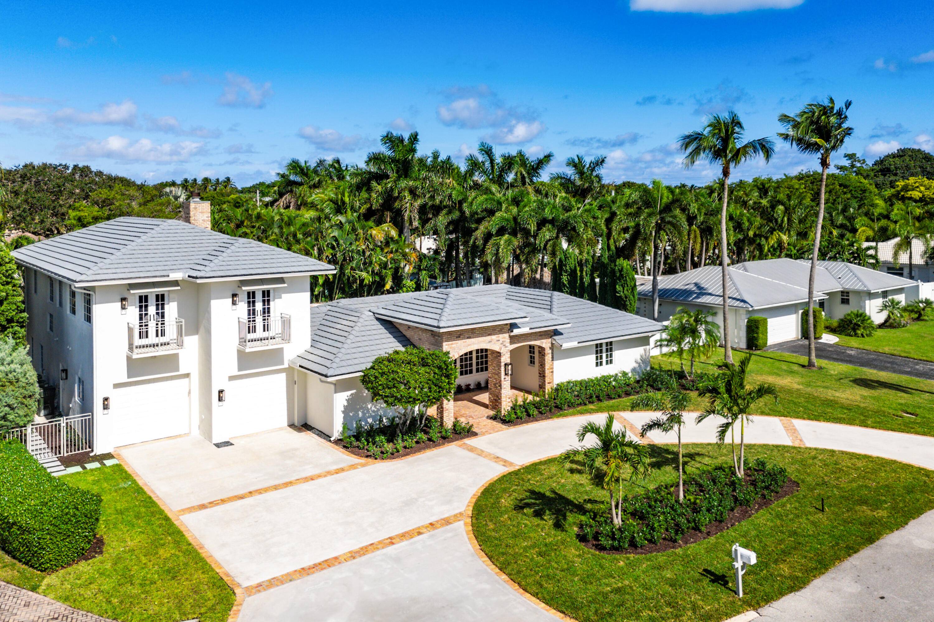 Welcome to 17 NW 25th Avenue, an exquisite residence in the highly sought after Lake Eden neighborhood of Delray Beach.