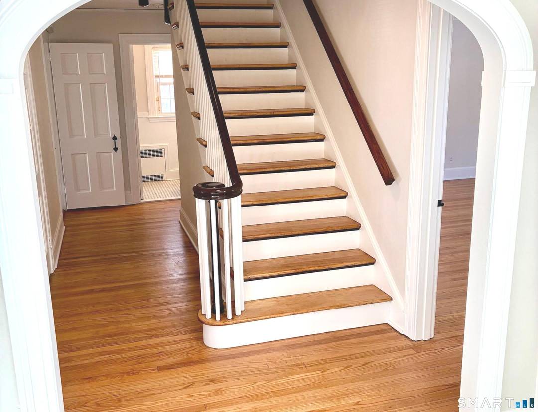 Sun filled classic center hall Colonial on one of West Hartford's prettiest streets.