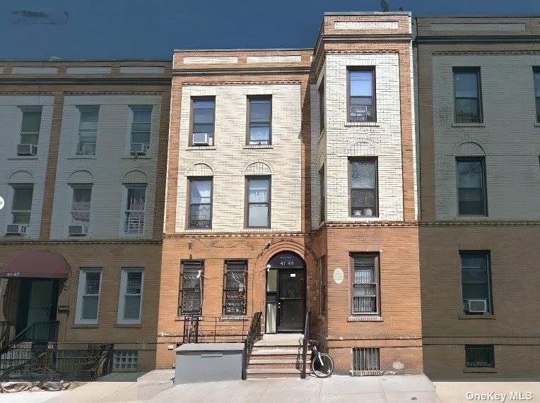 Rare opportunity to own 3 story, legal 6 family brick apartment building in the heart of Sunnyside.