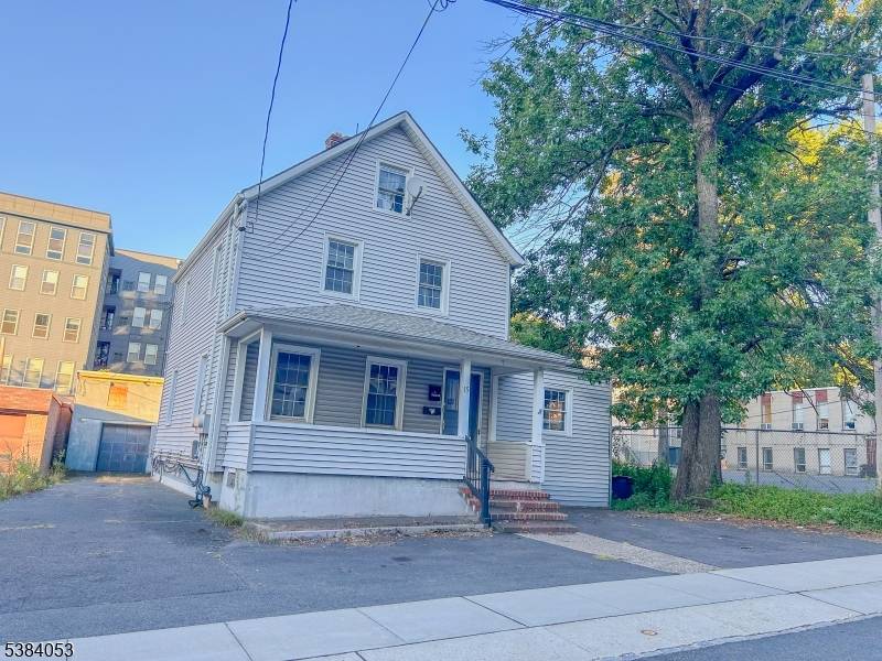 Great Opportunity to own this mix used property with 2 residential units and 1 commercial unit.