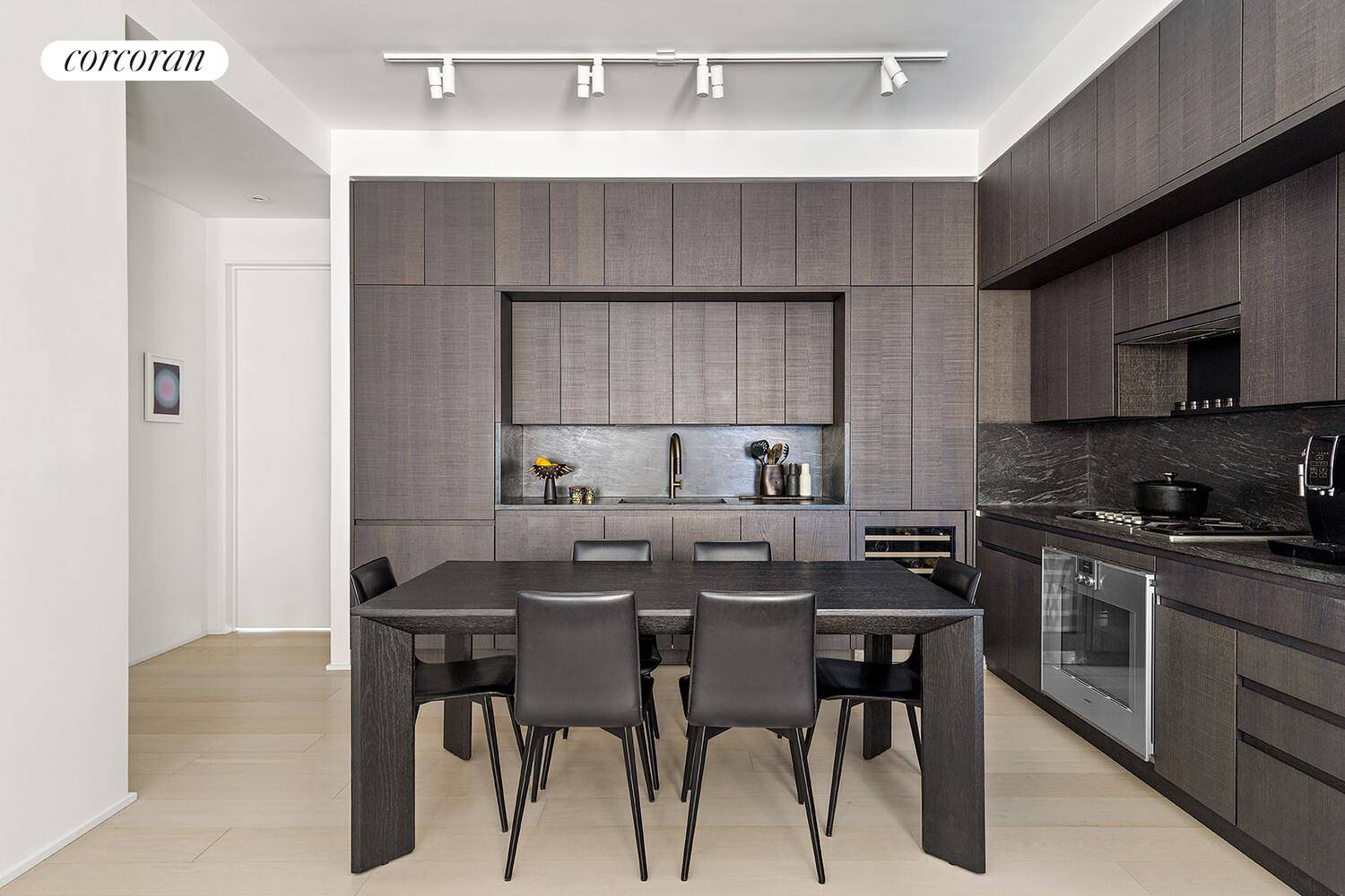 Welcome to Residence 14D, a meticulously crafted two bedroom, two bathroom home offering soaring 10 foot ceilings and iconic arched bronze detailed windows that flood the space with natural light.