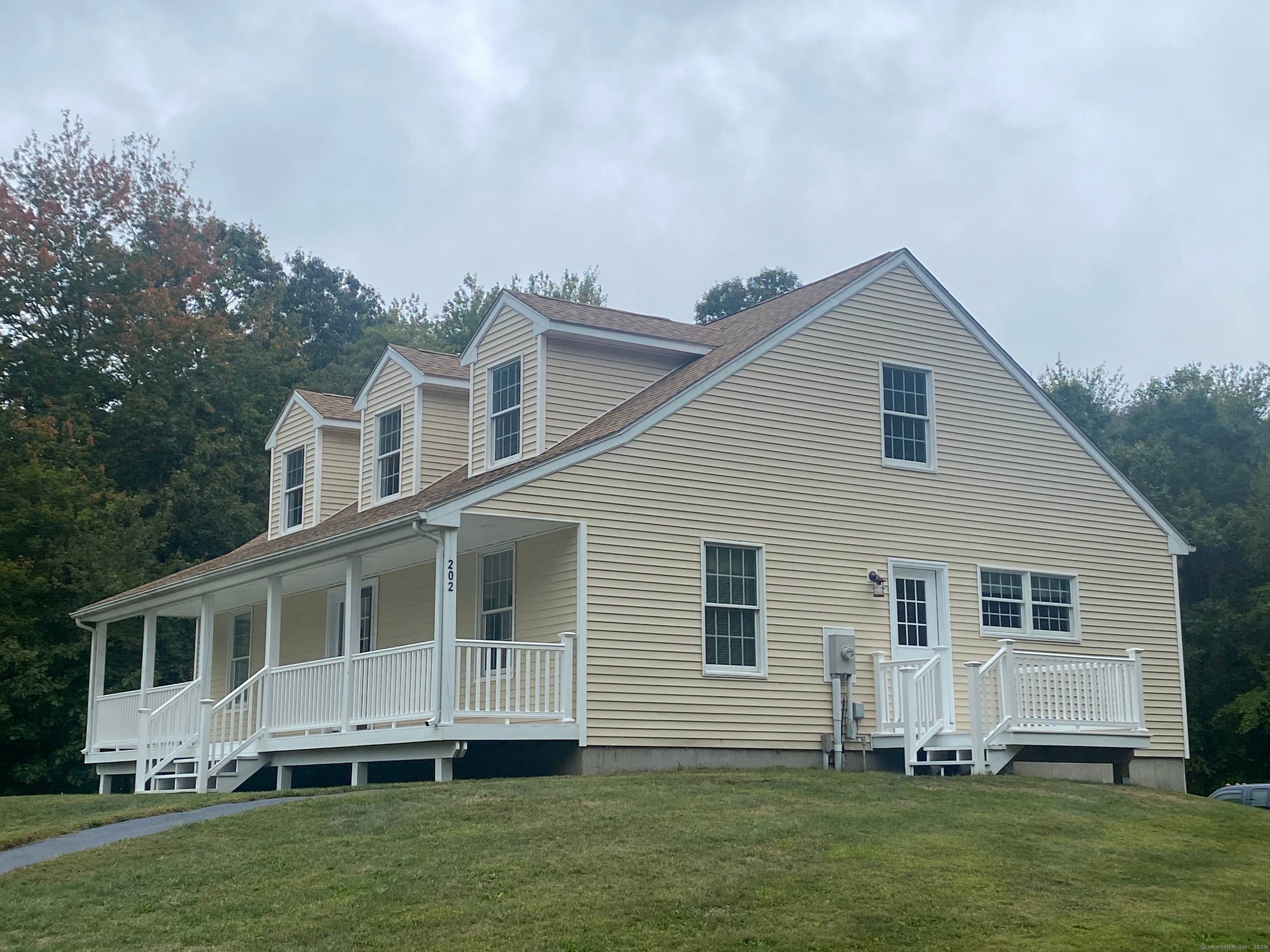 Nestled on 2. 6 private acres, this mint condition 1, 900 sq.