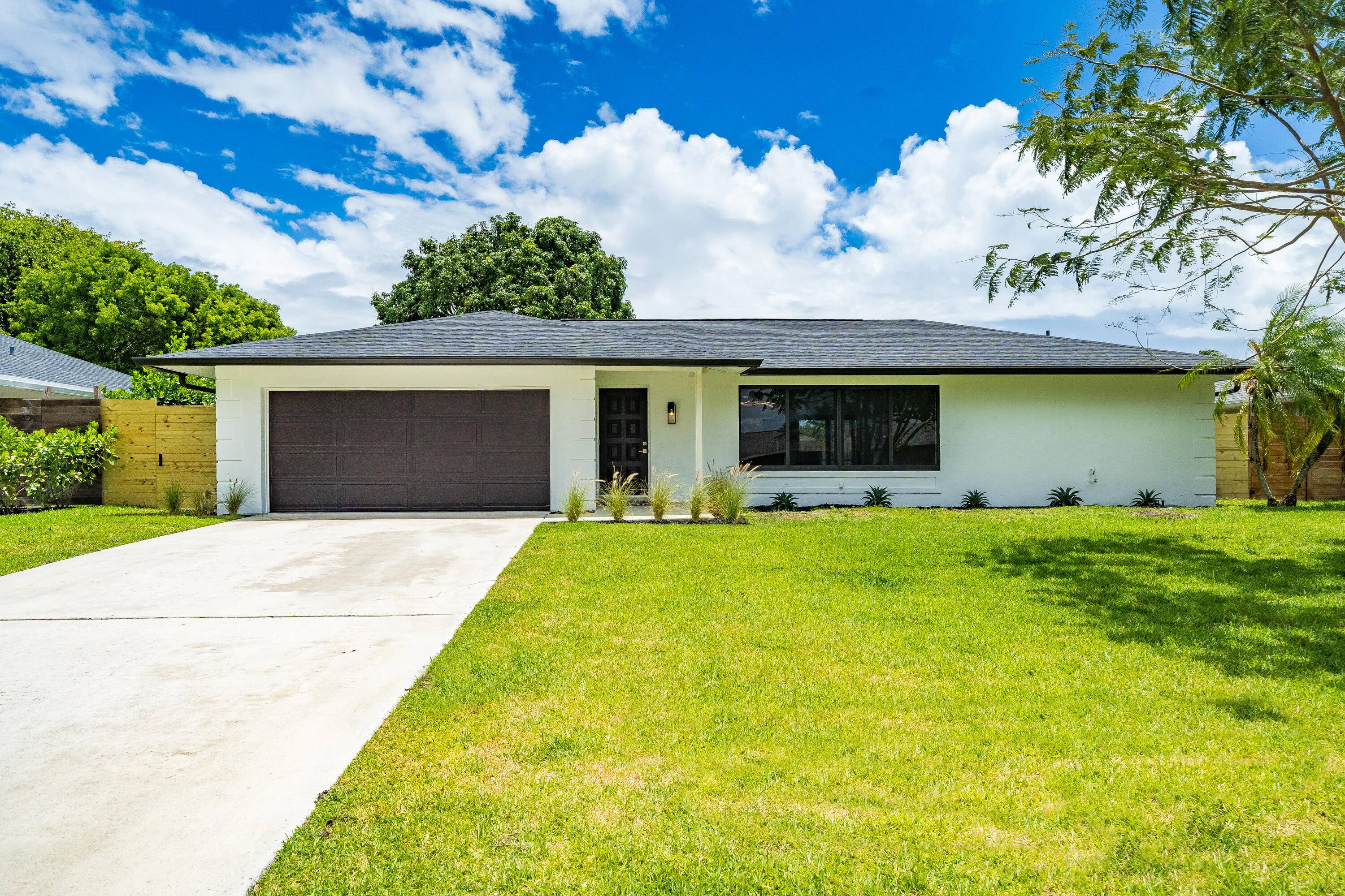 Large pets welcome. Gorgeous fully renovated, unfurnished, 4 Bedroom, 2 Bath, Pool Home w 2 Car Garage.