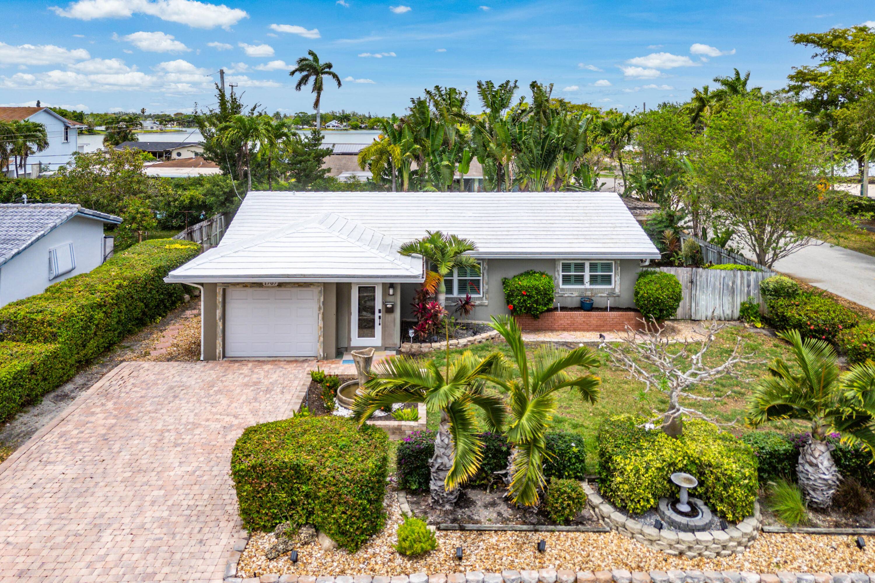 Welcome to 1707 NW 38th St, a completely renovated 3 bedroom, 2 bathroom pool home on a desirable corner lot in Oakland Park's Royal Palm Acres.
