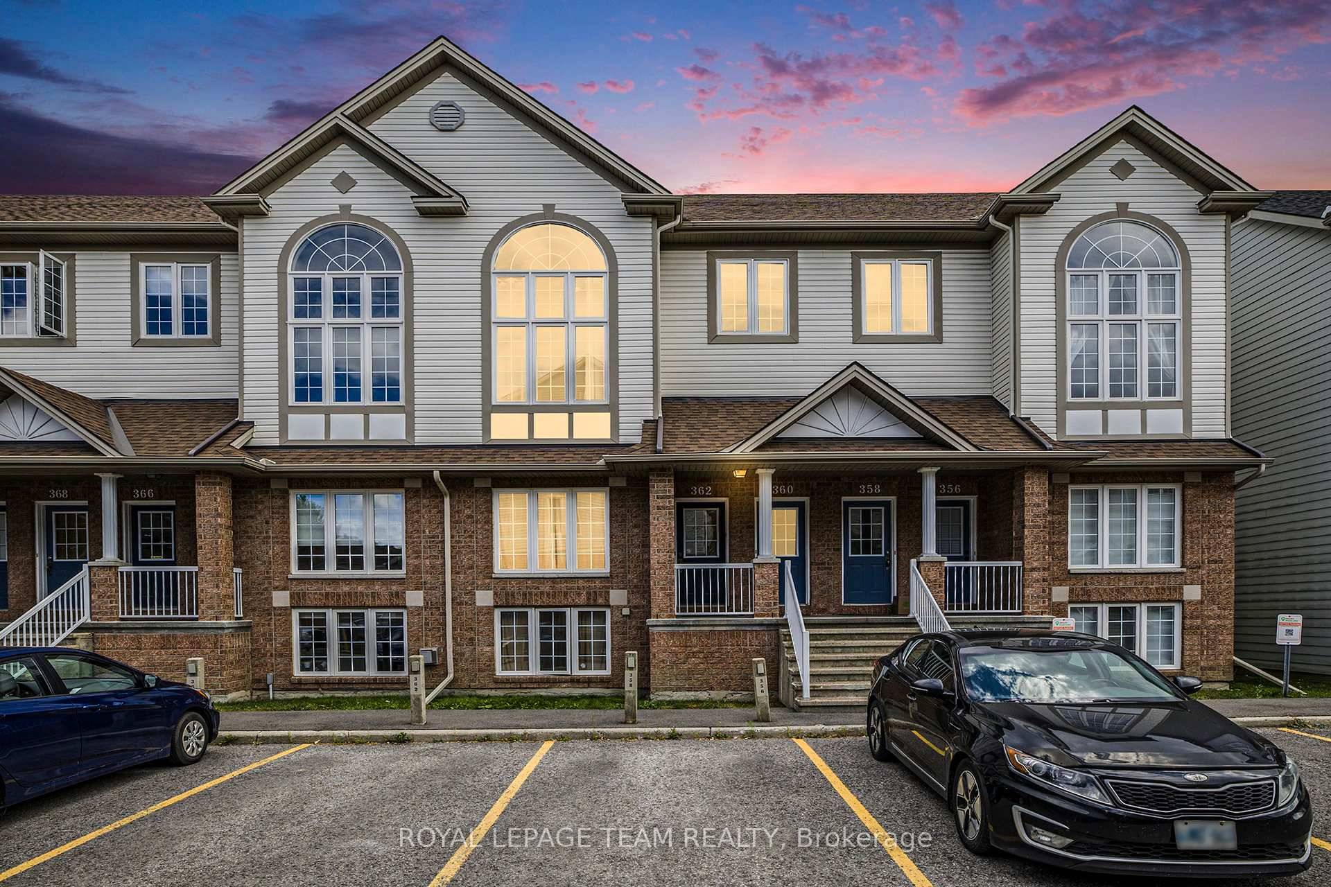 This stunning 2 bedroom, 2 bath upper level unit offers a modern open concept floor plan with soaring ceilings and dramatic 16 foot radius windows spanning two floors, filling the ...