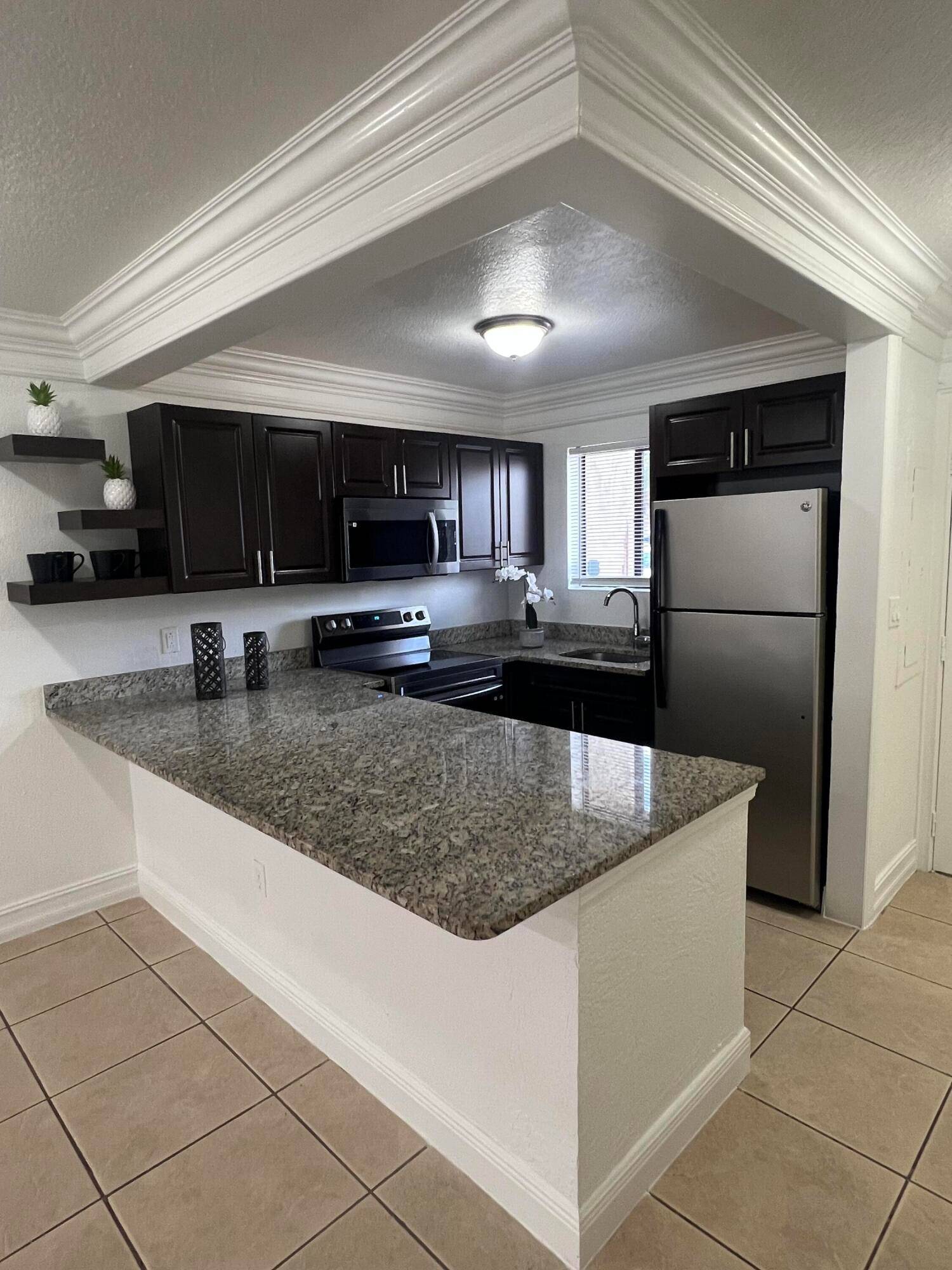 Beautiful, bright and spacious first floor corner unit, comfortable patio, parking spot right in front of the unit, turn key, no extra investment needed, valued for a quick sale.
