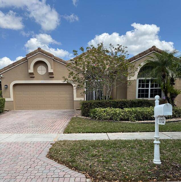 LARGEST MODEL with SUPER HIGH CEILINGS, tropical back and front yard landscaping.