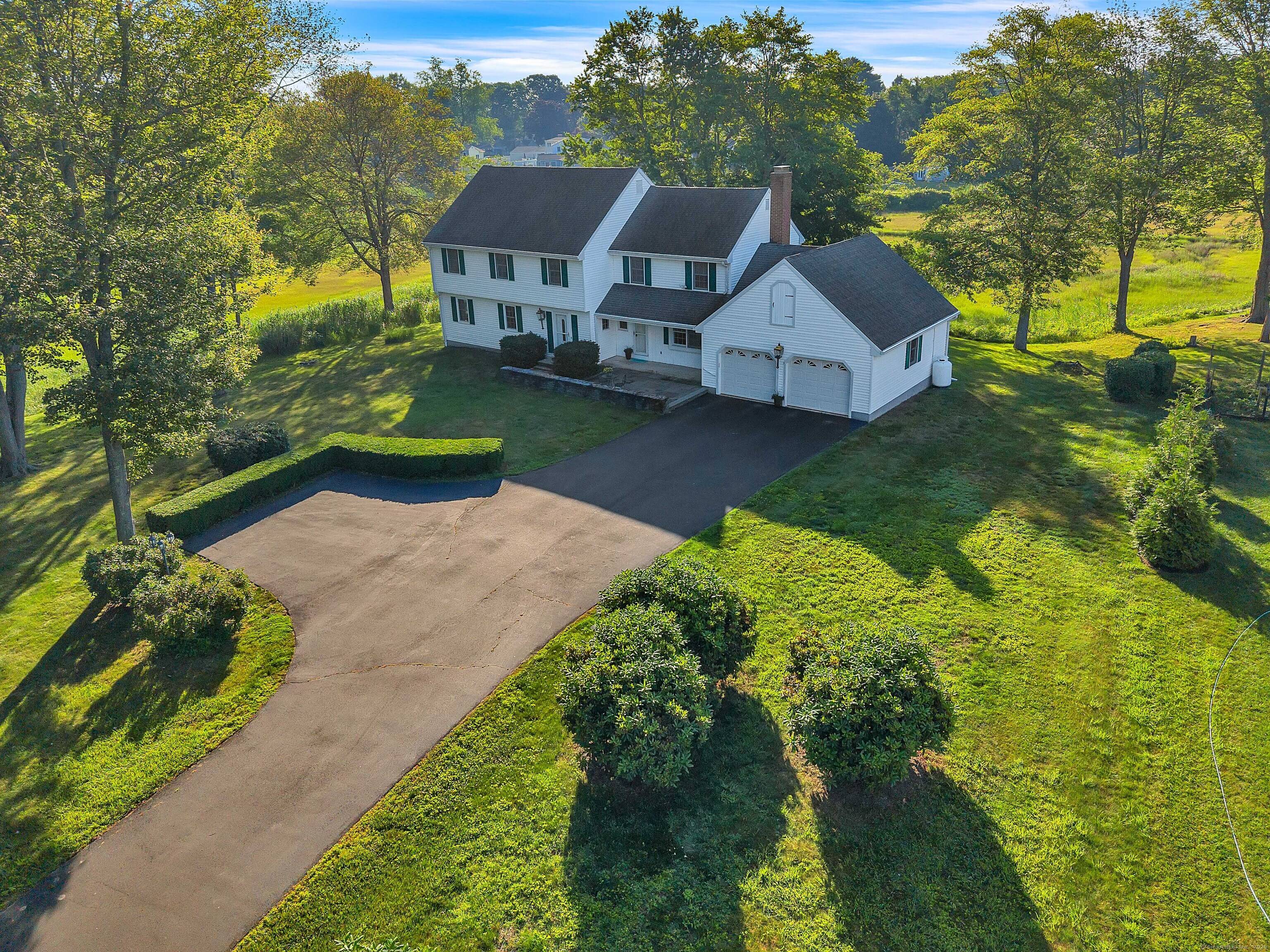 Welcome to 7 Sharon Lane, a classic Colonial on 1.