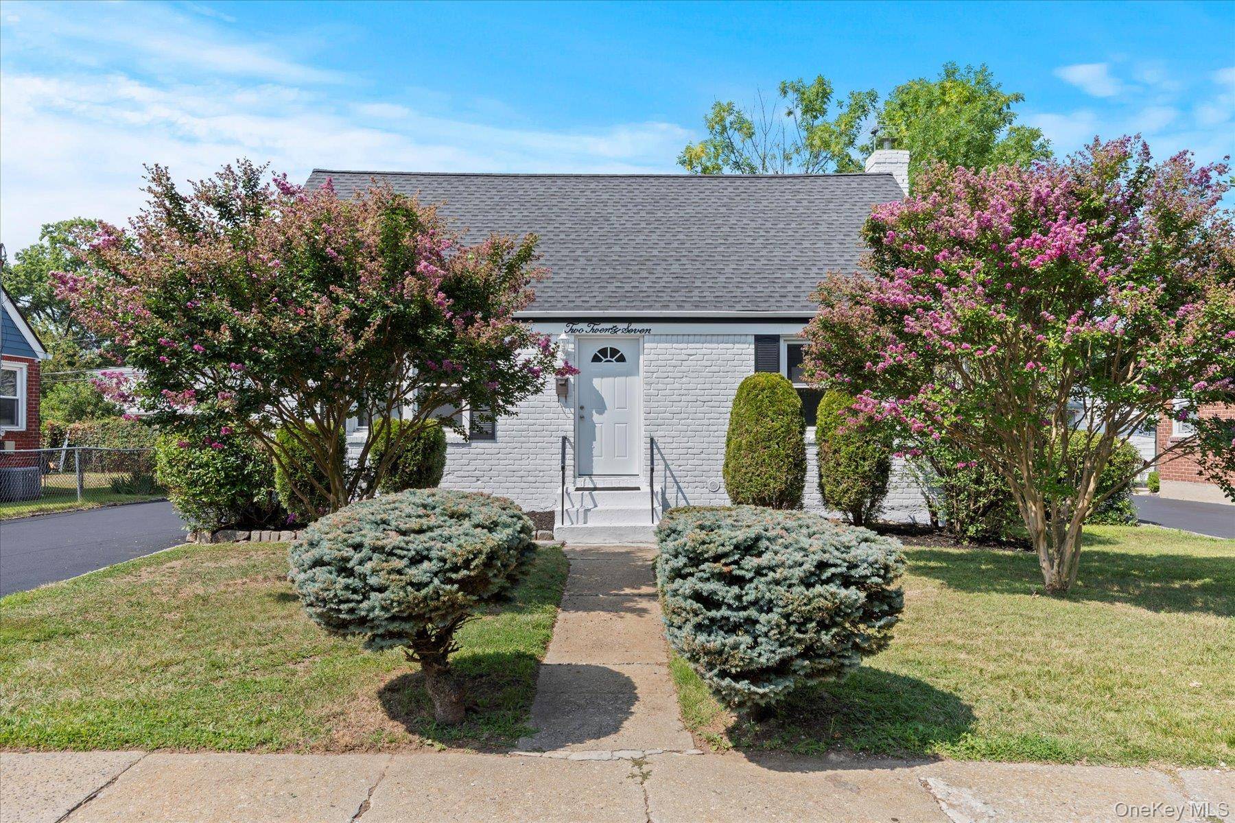 Spacious renovated cape home in prime location offers style, comfort and convenience.