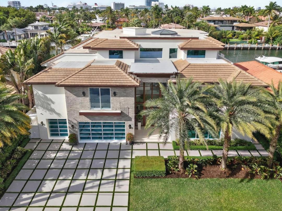 Recently reimagined with striking architectural detail, the home makes an unforgettable first impression with its newly refaced fac ade and exceptional curb appeal.