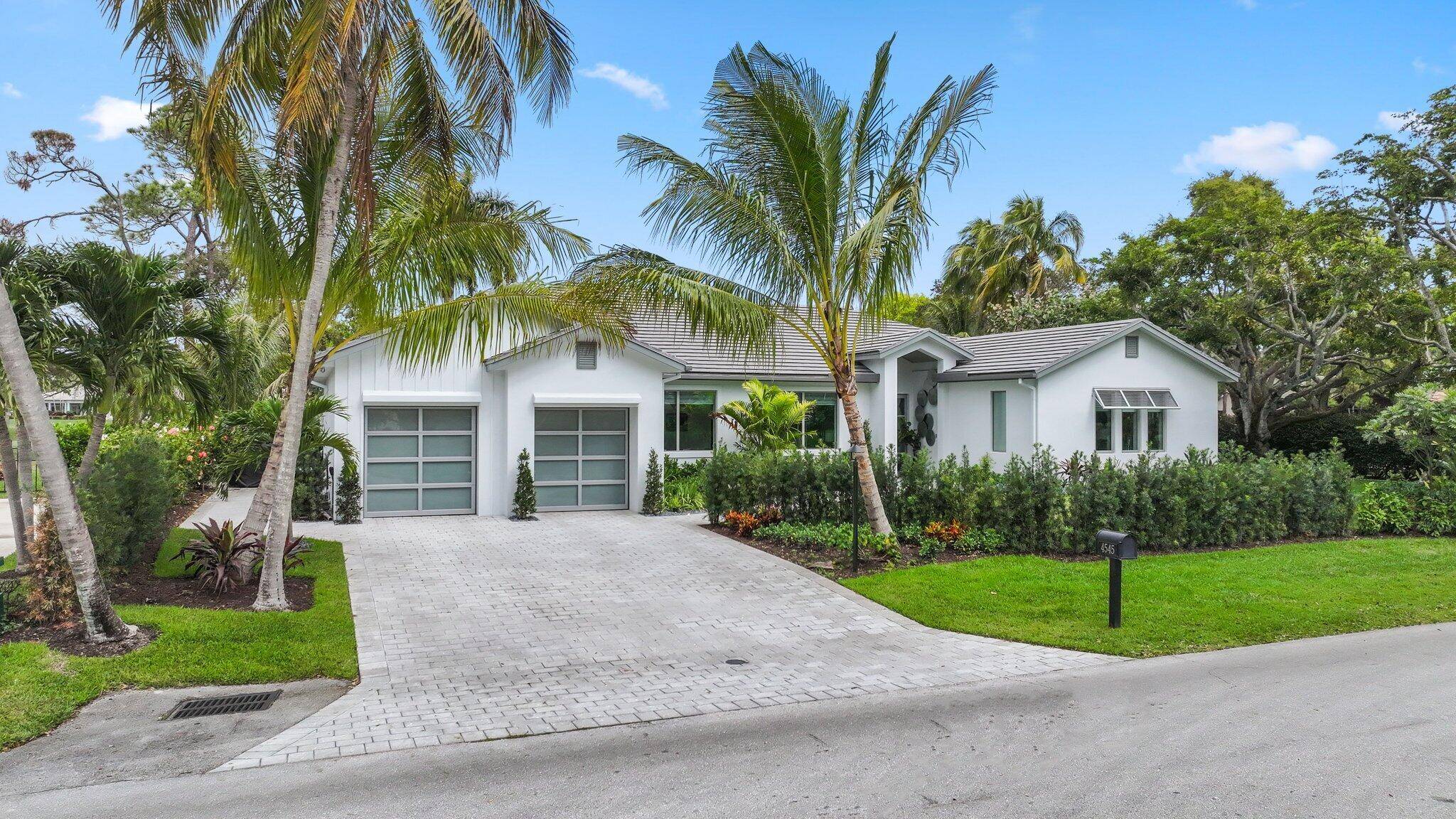 Transitional new construction home was completed in 2024by Signature Builders as a custom home for the business owner.