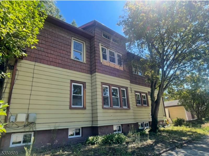 This beautifully renovated second floor multifamily property features four bedrooms, including a master bedroom with its own master bathroom, plus another full bathroom.