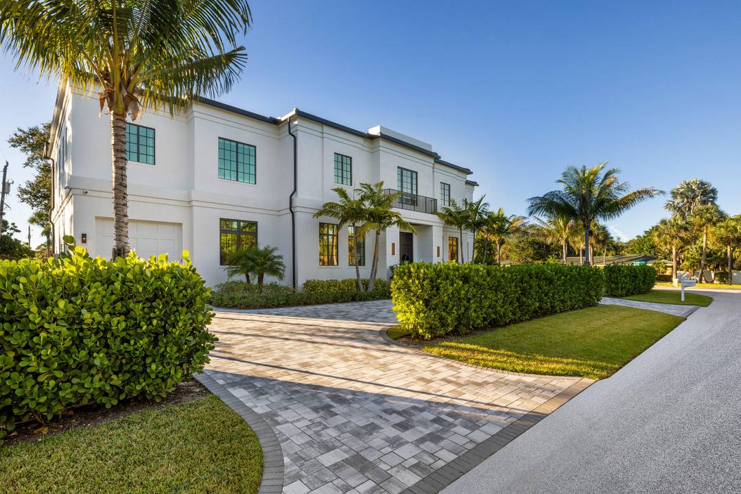 Welcome to 12385 Coconut Row Road, nestled off of Prosperity Farms Road in the heart of Palm Beach Gardens.