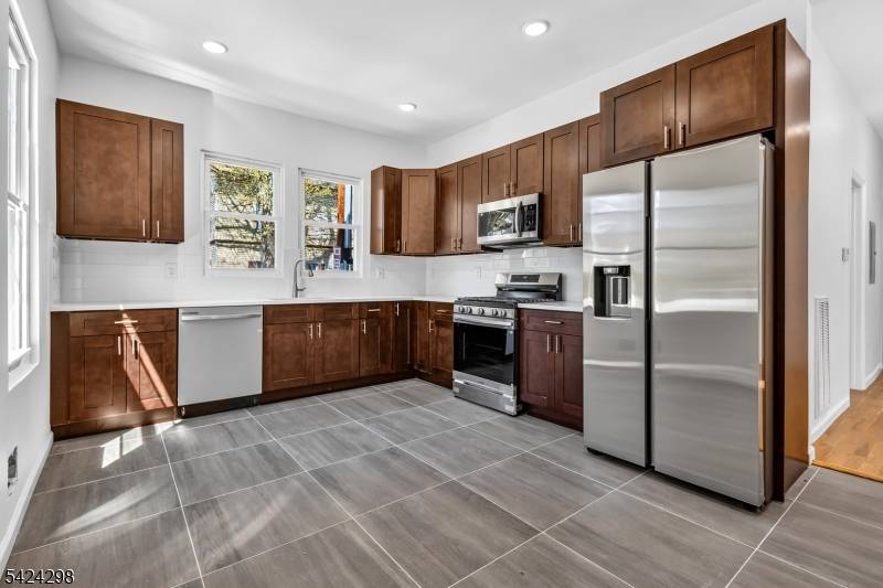 Fully renovated multi family property offering exceptional versatility and income potential.