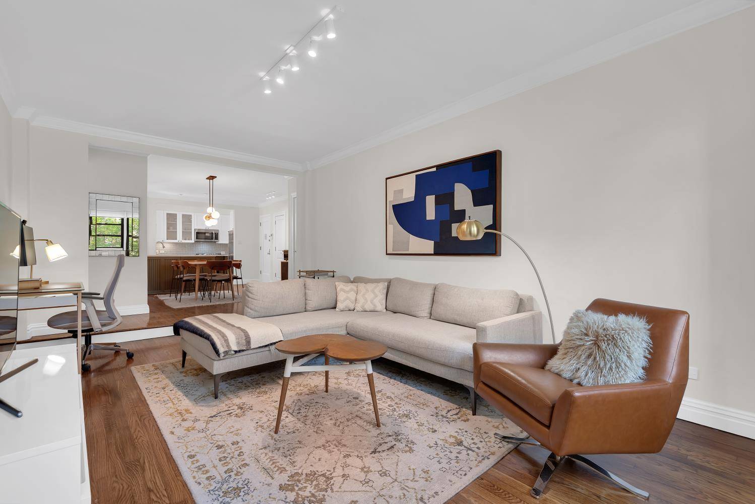This pristine two bedroom, two bathroom home offers a smart, light filled layout with northern and southern exposures and charming treetop views.