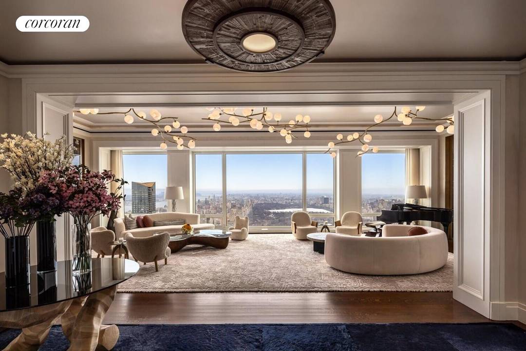 Perched on the 62nd floor of 220 Central Park South, this 5, 935 square foot simplex offers 125 linear feet of unobstructed frontage over Central Park, capturing sweeping views across ...