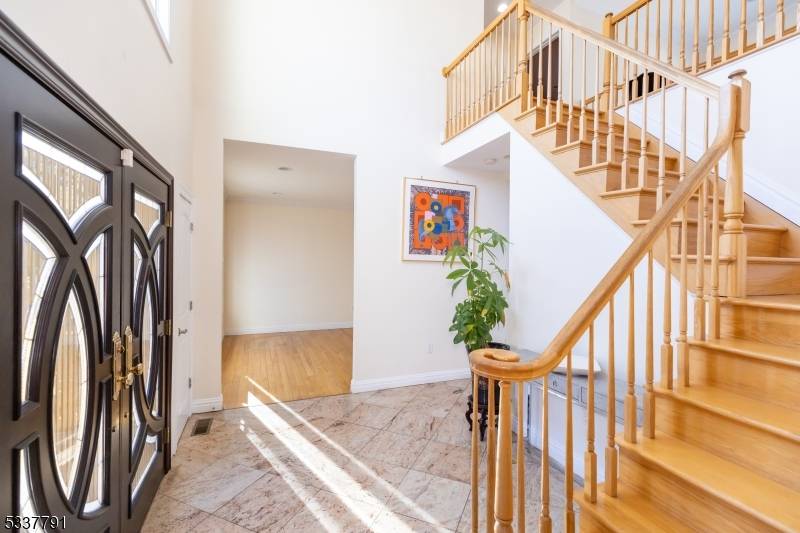 Newer North Edison Home Custom brick front exterior with full finished basement with full bath Separate entrance Possible Home Office First floor with bedroom and full bath could be maids ...