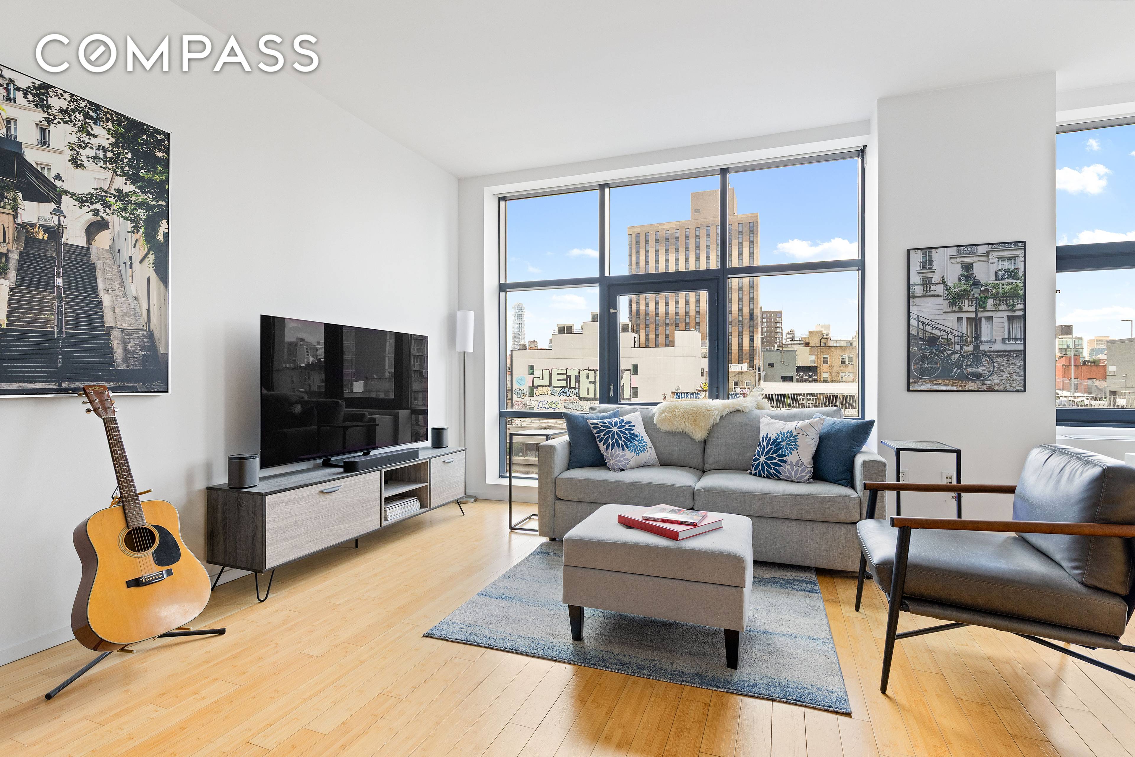 Discover the vibrant energy of the Lower East Side from Residence 7A at 105 Norfolk Street.