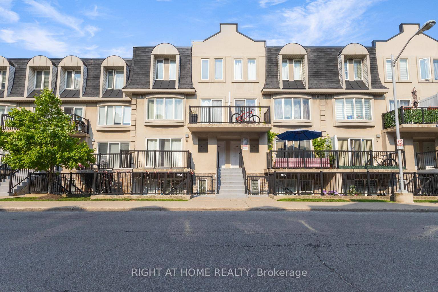 Gorgeous 3 Bedroom Stacked Townhouse in a quiet, well maintained complex, featuring the rare bonus of two private balconies and 2 underground PARKING spaces and a storage space,.