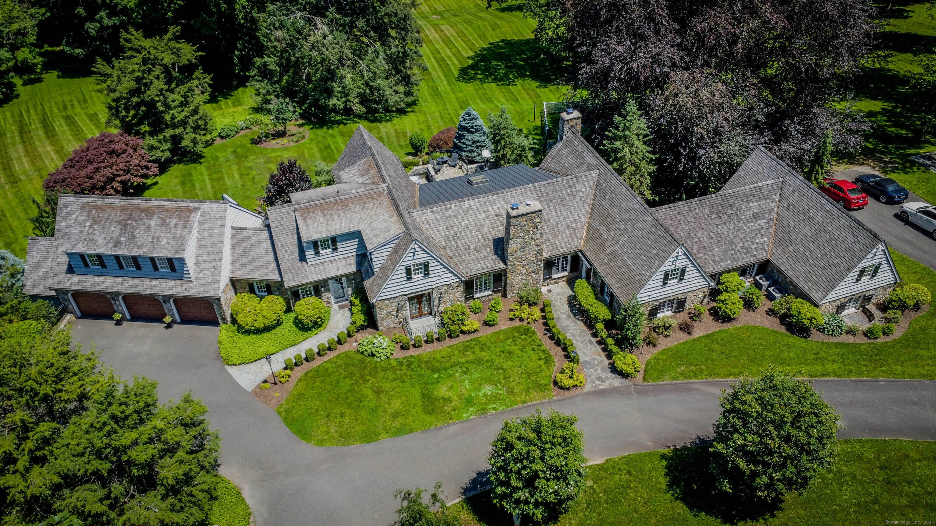 Discover this one of a kind custom built Cape style home set on a breathtaking 15 acre estate.