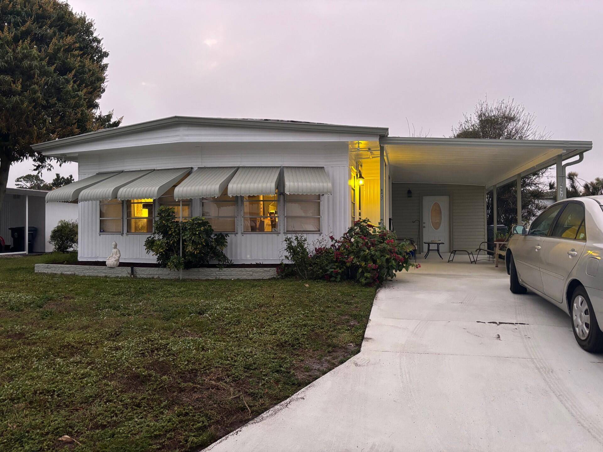 PRICE REDUCED ! ! ! Beautiful 2 bedroom 2 bath home in the quiet, gated 55 community of Maralago Cay in Lantana, FL.