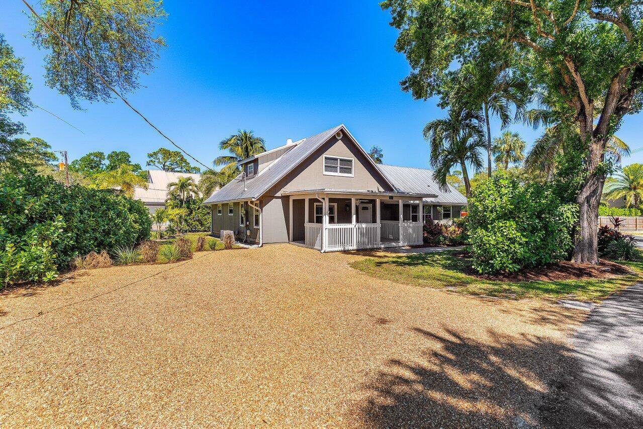 Discover this beautifully updated Coastal Farmhouse in a hidden gem of a neighborhood, offering dockage for your boat !